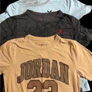 T-Shirt Trio in Jordan in Tan, Jordan in Black, and Hurley in Light Blue